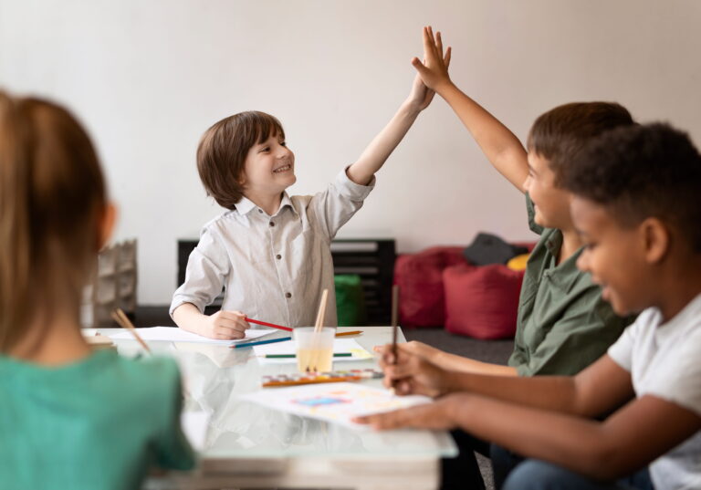 Children playing safely in a licensed daycare classroom.
